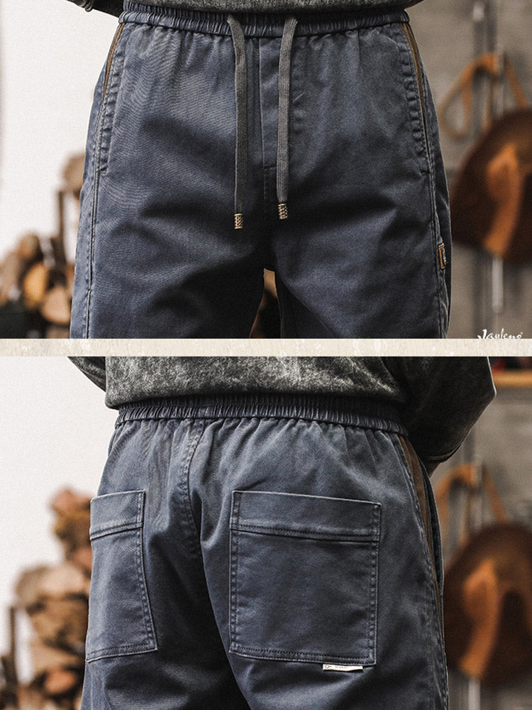 Herren-Jogginghose mit Seitenstreifen und Vintage-Waschung