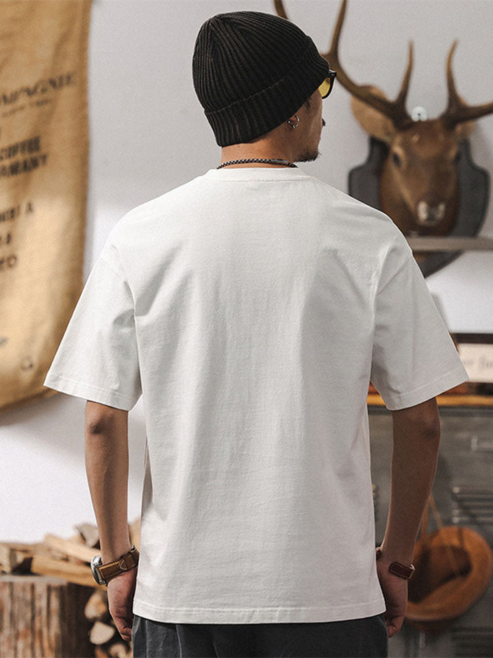 Camiseta de manga corta holgada con bolsillos en contraste para hombre