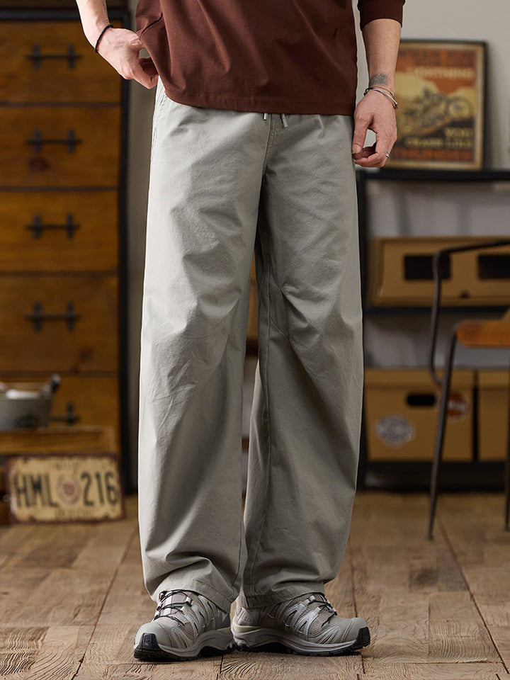 Pantalones casuales de algodón de pierna ancha con cordón para hombre