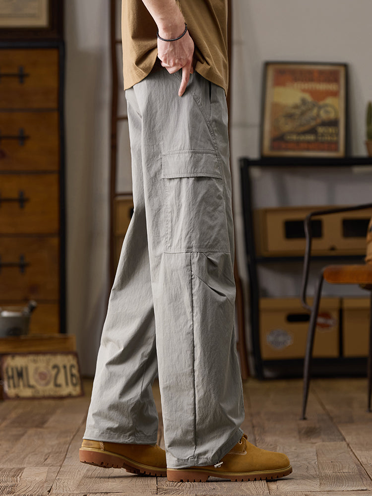 Pantalones cargo de pierna ancha para hombre con múltiples bolsillos y cremallera