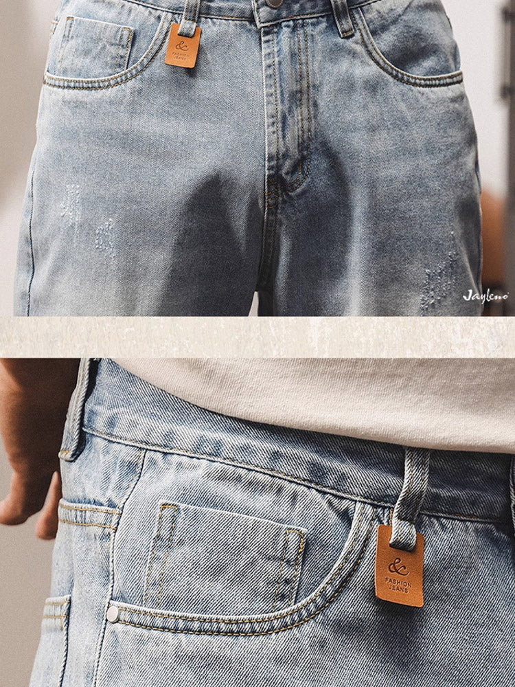 Jean pour homme avec délavage subtil et détails vintage effet usé