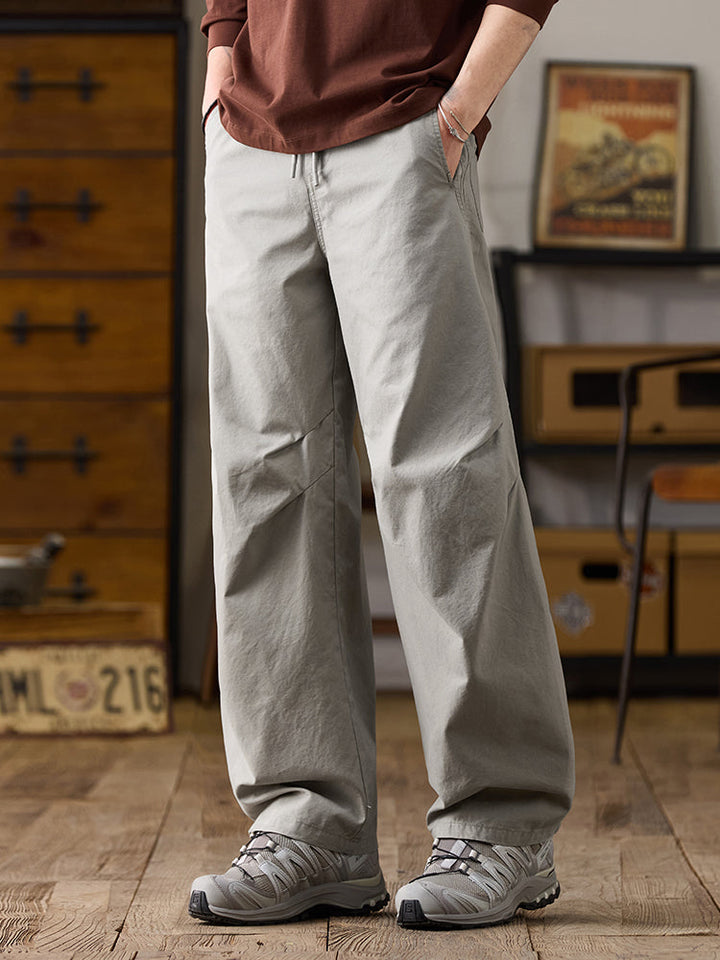 Pantalones casuales de algodón de pierna ancha con cordón para hombre