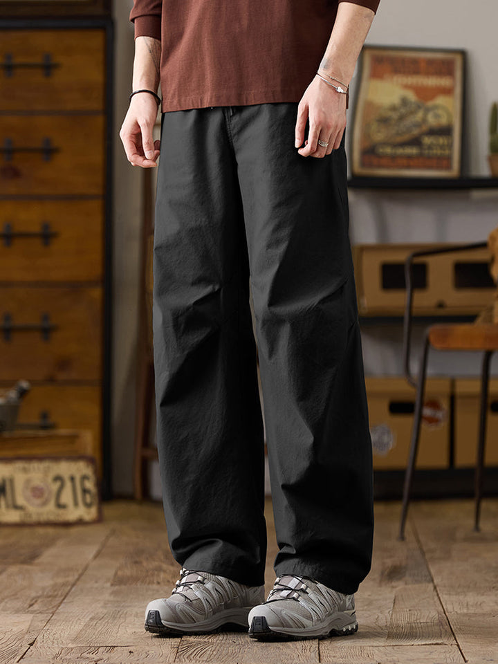 Pantalones casuales de algodón de pierna ancha con cordón para hombre