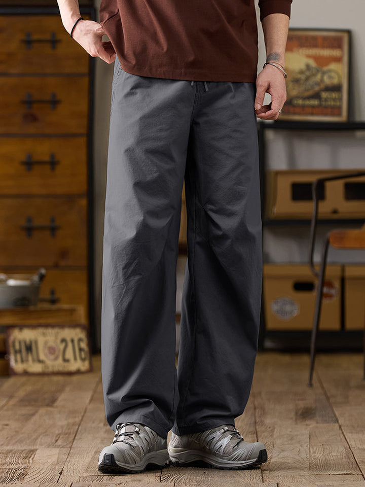 Pantalones casuales de algodón de pierna ancha con cordón para hombre