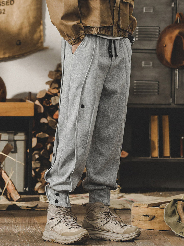 Pantalon de jogging pour homme avec détails boutonnés et taille confortable